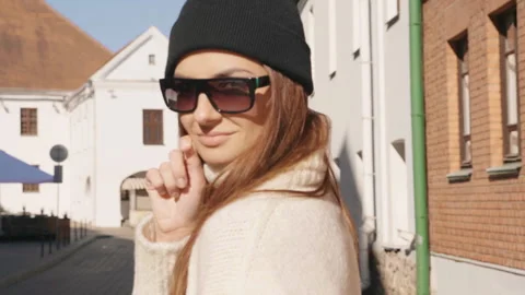 Portrait of beautiful smiling model posing outdoors Stock Footage 146110551