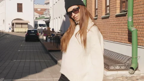 Portrait of beautiful smiling model posing outdoors Stock Footage 146110603