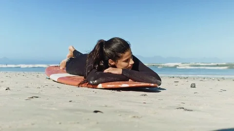 Portrait of beautiful surfer on beach Video stock 76521371