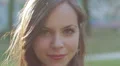 portrait of beautiful woman is looking around smiling HD Footage