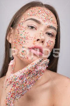 Portrait of beautiful woman with sparkles. Stock Photos