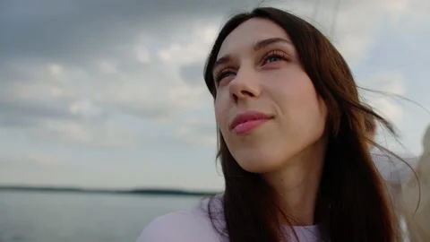 Portrait of a beautiful young brunette while walking on a yacht Stock Footage 201191739