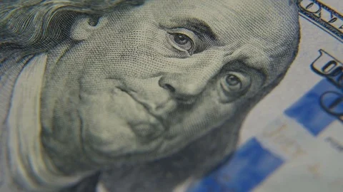 A portrait of Benjamin Franklin on a hundred-dollar bill close-up Stock Footage 75456840