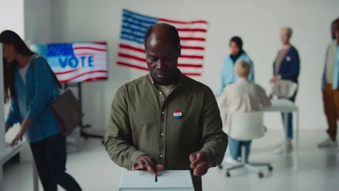 Portrait of Black American Man Casting Ballot in Local Elections Stock Footage 246370395