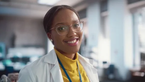 Portrait of Black Engineer in Lab Looking at Camera Stock Footage 243255821