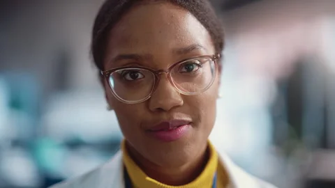 Portrait of Black Engineer in Lab Looking at Camera Stock Footage 243255947