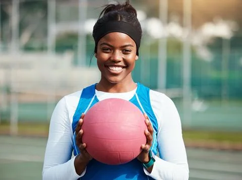 Portrait, black girl with netball and sports with smile, fitness and training Stock Photos