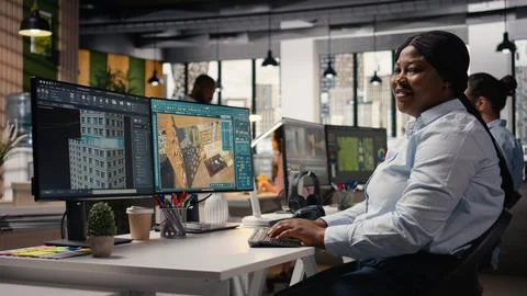 Portrait of black interior designer using high tech software for modern layout Stock Photos