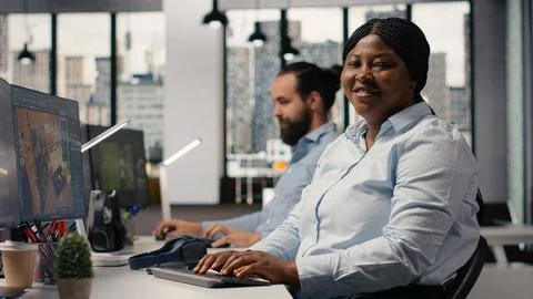 Portrait of black interior designer using high tech software for modern layout Stock Photos