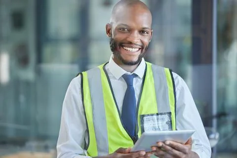 Portrait, black man and engineer with tablet for engineering research 写真素材