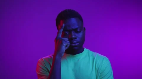 Portrait of Black Man Looking at Camera with Thinking Face Considering Thoughts Stock Footage 257780793