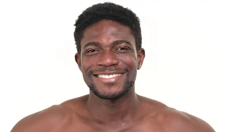 Portrait of a black man smiling. Isolated on a white background. Stock Footage 161949357