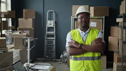 Portrait of Black Man Warehouse Worker Standing with Arms Crossed Stock Footage 337306774
