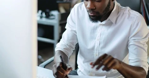 Portrait black man working use computer feel happy smile looking in monitor Stock Footage 81966394