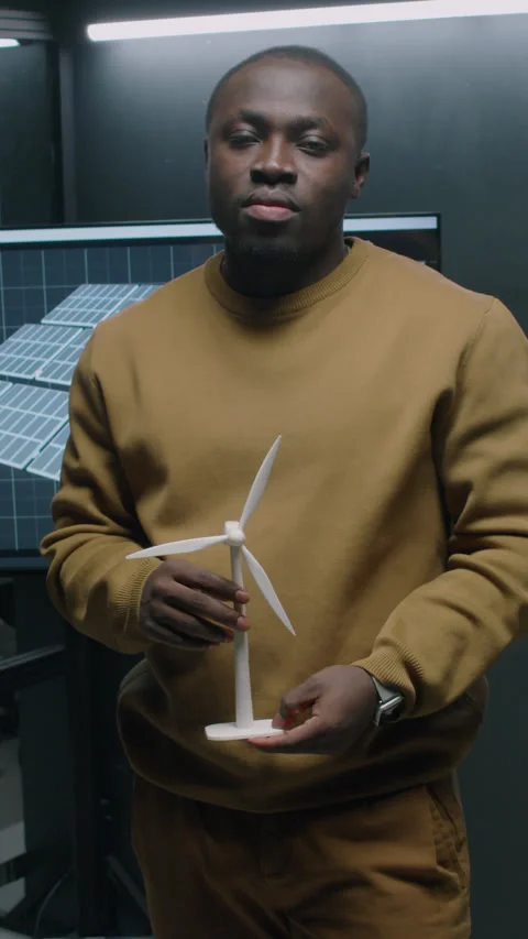 Portrait of Black Renewable Energy Engineer Posing with Windmill Model Stock Footage 271222299