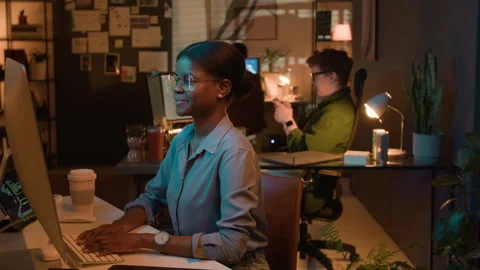 Portrait of Black Woman Programmer Working on Computer in Office at Night Stock-Footage 336717495