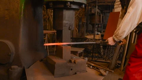 Portrait of a blacksmith on the background of a forge. Stock-Footage 104404675