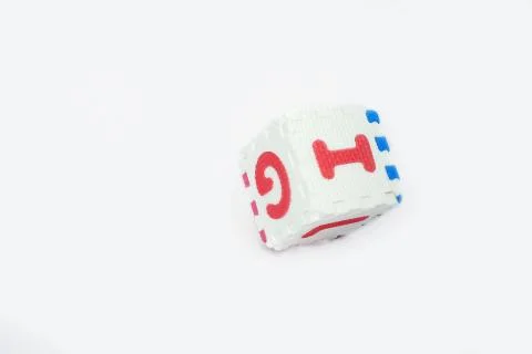Portrait of block forming a cube with alphabets Stock Photos