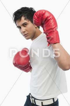 Portrait of a boxer in action Stock Photos