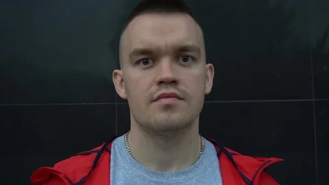 Portrait of boxer looking at camera face close up outdoors. Stock Footage 90848109