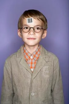Portrait of boy with bar code label on his forehead Stock Photos