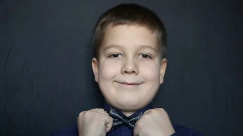 Portrait of a boy close-up on a black background. Full hd video Vídeos de archivo 71781621