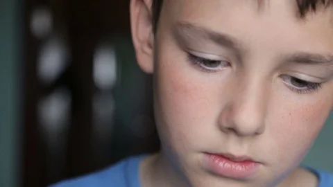 Portrait of a boy close-up Stock Footage 76449312