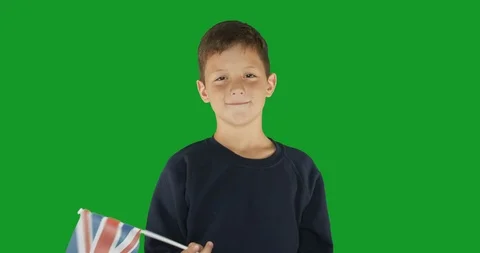 Portrait of boy with flag of great britain. Green screen hromakey background for Stock Footage 117930126