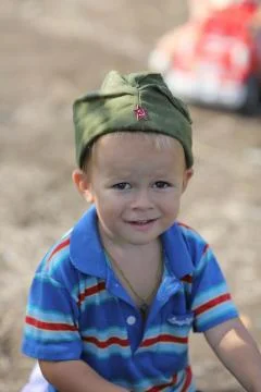 Portrait of a boy in garrison cap Stock Photos