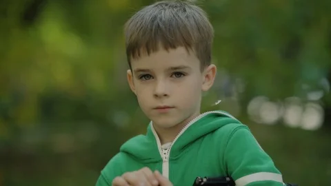 Portrait of Boy Looking to the Camera Stock Footage 95751395