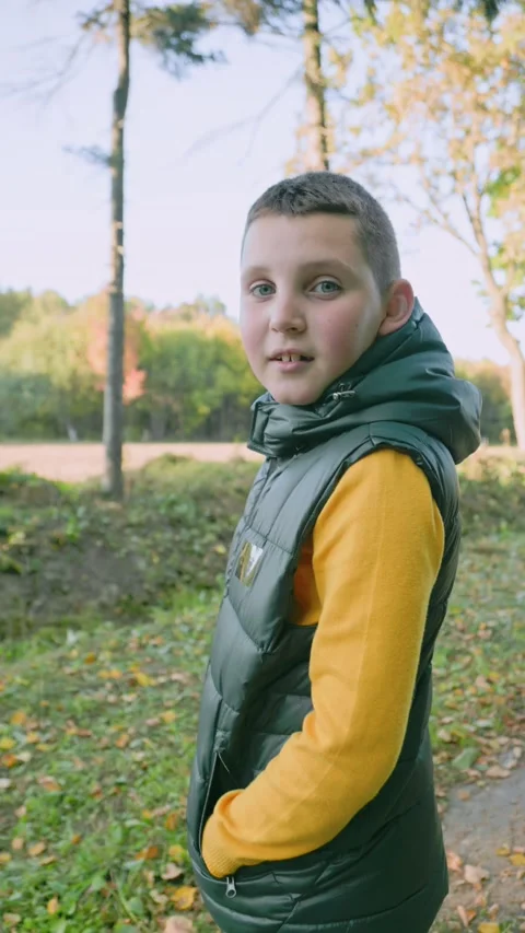 Portrait of a boy in nature Stock Footage 165563947