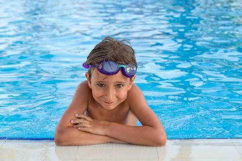 Portrait of the boy in the pool Stock Photos