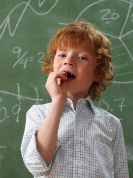 Portrait of Boy Pulling Front Teeth Stock Photos