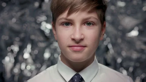 Portrait Of Boy On Shiny Surface. Stock Footage 181545804