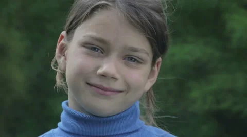 Portrait of a boy in the spring with a flower of yellow narcissus. Stock Footage 62552054