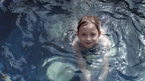 Portrait of boy in swimming pool. Stock Footage 64105395