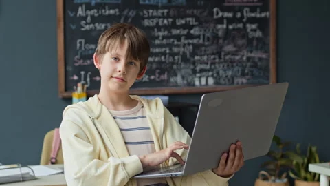 Portrait of Boy Using Laptop Computer in Stem Robotics Class Stock Footage 339205283
