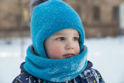Portrait of boy in winter outdoors Stock Photos