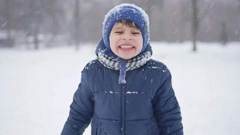 Portrait of a boy in winter showing teeth Stock Footage 171563697
