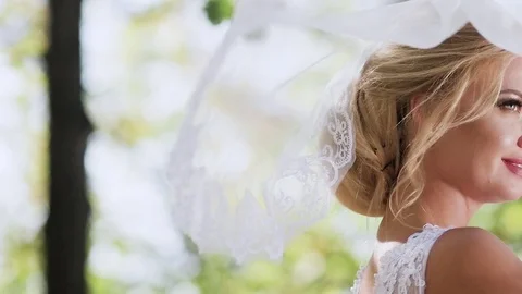 Portrait of a bride close-up on wedding day. walk in the park Stock-Footage 81468582