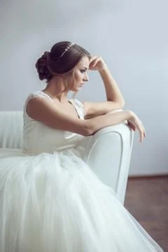 Portrait of the bride on the couch Stock Photos