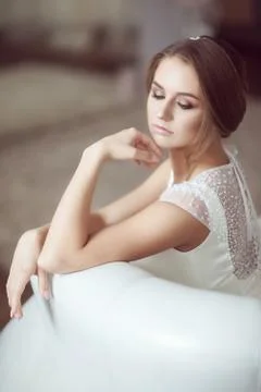 Portrait of the bride on the couch Stock Photos