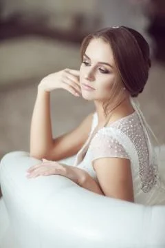 Portrait of the bride on the couch Stock Photos