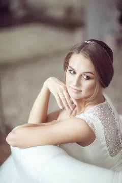 Portrait of the bride on the couch Stock Photos