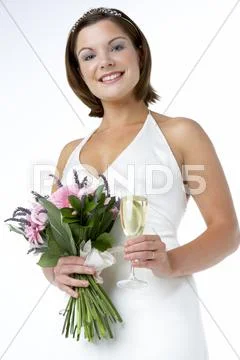 Portrait Of Bride Holding Bouquet And Wine Glass Stock Photos