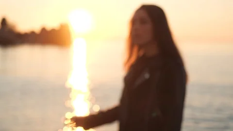 Portrait of a brunette at sunset Stock Footage 106342630