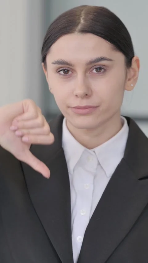 Portrait of Buisnessman Doing Thumbs Down, vertical Stock Footage 326293760
