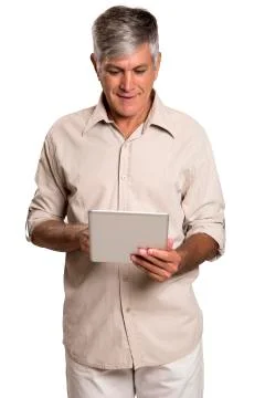 Portrait of a business man using a tablet Stock Photos
