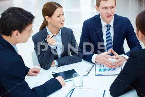 Portrait of business partners discussing new ideas at meeting Stock-Fotos