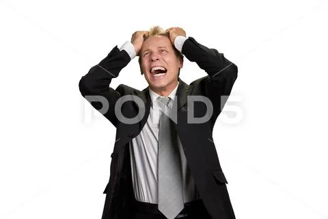 Portrait of businessman in full desperation. Stock Photos